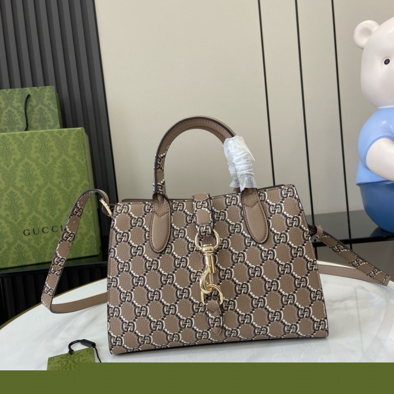 G*u*i top handle bags